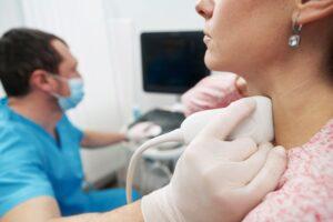 young-woman-undergoing-an-examination-of-thyroid
